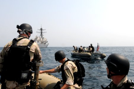 US Navy 110820-N-QL471-119 Sailors from the USS Truxton visit, board, search, and seizure team participate in a training exercise photo