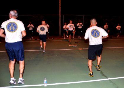US Navy 110812-N-OH262-012 Chief petty officer selectees lead the Chief's Mess in an exercise during physical fitness training at Naval Station Gua