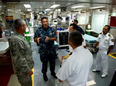 US Navy 110810-N-RM525-124 Commodore Brian Nickerson, mission commander for Continuing Promise 2011, gives Costa Rican Coast Guard officials