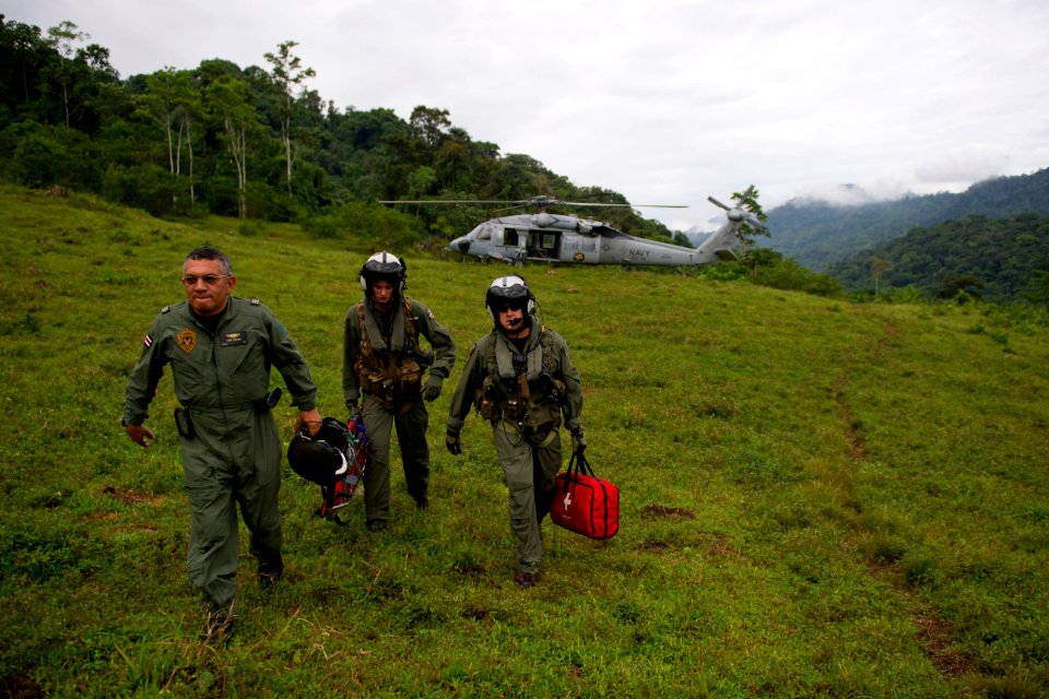 US Navy 110810-N-RM525-443 Costa Rica Police Air Patrol Officer Capt. George Lozano, left, Naval Air Crewman 3rd Class Joe Wainscott and Chief Nava
