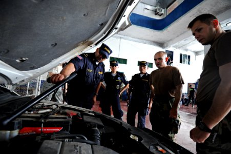 US Navy 110809-N-NY820-120 Sailors participate in a subject matter expert exchange with local police in Puntarenas, Costa Rica, during Continuing P photo