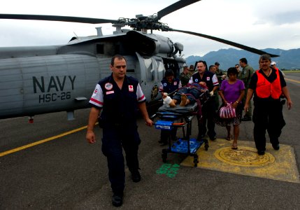 US Navy 110810-N-RM525-853 Costa Rican paramedics prepare to take an injured boy to a local hospital in San Jose, Costa Rica photo