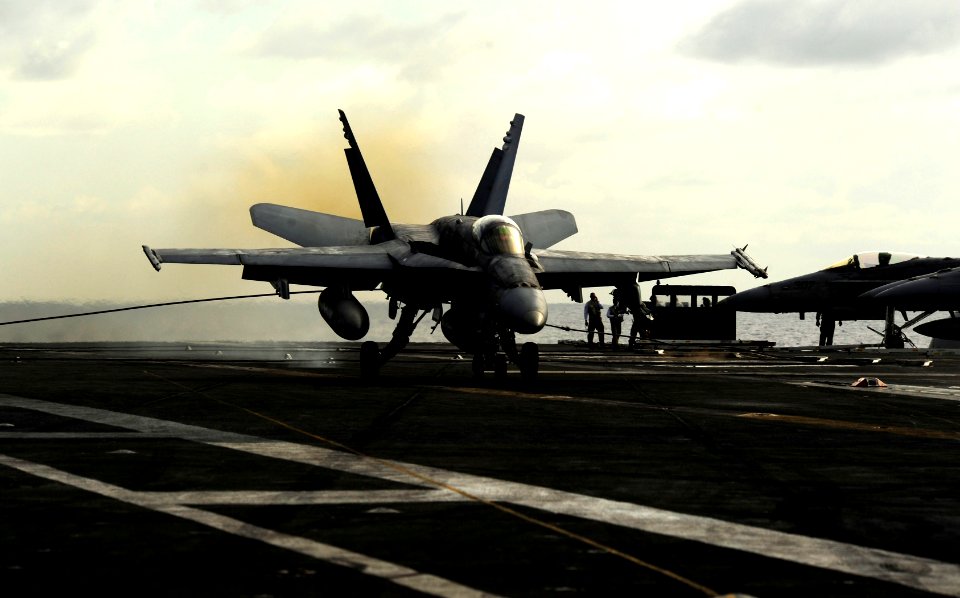 US Navy 110812-N-ZZ999-523 An F-A-18C Hornet lands aboard the USS John C. Stennis (CVN 74)