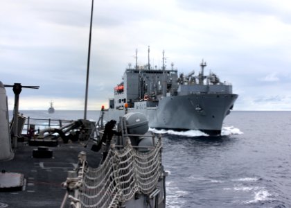 US Navy 110809-N-ZI300-035 The guided-missile frigate USS Thach (FFG 43) maneuvers away from the Military Sealift Command dry cargo and ammunition