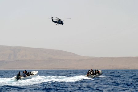 US Navy 110813-N-TY225-097 A visit, board, search and seizure team from the guided-missile cruiser USS Anzio (CG 68) tows a skiff with seven Somali