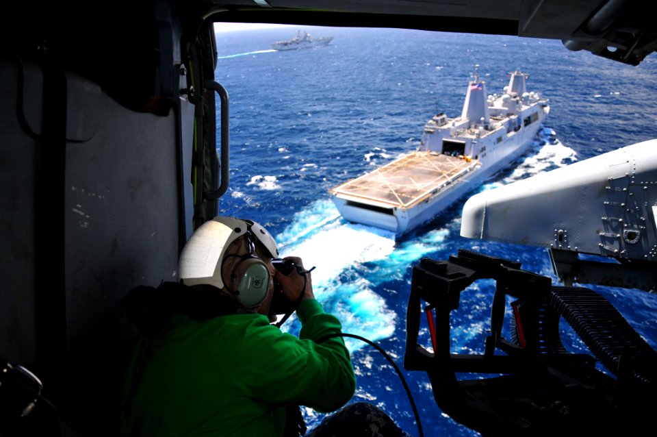 US Navy 110818-N-ZS026-223 Mass Communication Specialist photographs ships in the Boxer Amphibious Ready Group