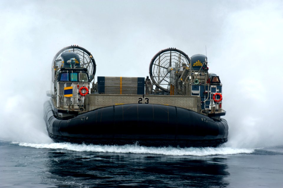 US Navy 110815-N-PB383-002 A landing craft air cushion approaches the well deck of the San Antonio-class amphibious transport dock ship USS New Orl