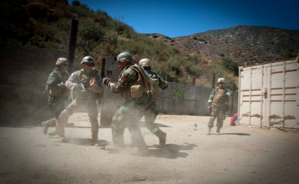 US Navy 110814-N-WR307-218 Quick Shot participants participate in weapons retention