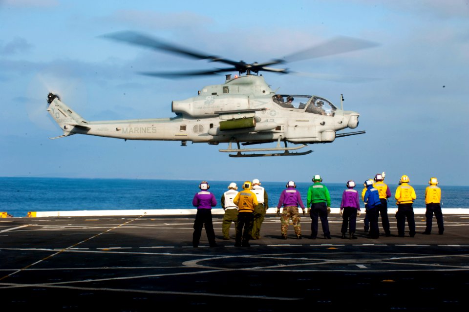 US Navy 110812-N-PB383-010 Sailors and Marines aboard the USS New Orleans (LPD 18) observe a Marine Corps AH-1Z Cobra attack helicopter lift off du