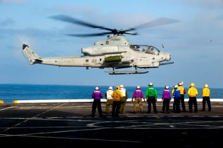 US Navy 110812-N-PB383-010 Sailors and Marines aboard the USS New Orleans (LPD 18) observe a Marine Corps AH-1Z Cobra attack helicopter lift off du