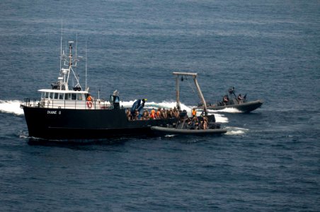 US Navy 110814-N-PB383-005 Marines assigned to the 11th Marine Expeditionary Unit (11th MEU) Maritime Raid Force conduct a mock raid