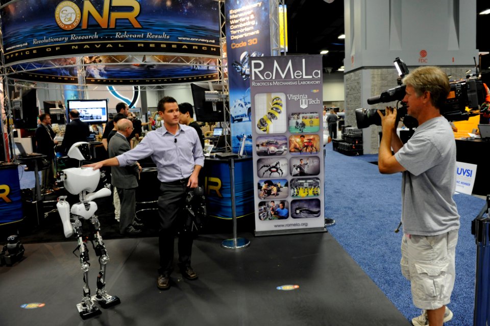 US Navy 110817-N-PO203-062 Paul Raphel from Fox 5 News talks about CHARLI, or Cognitive Humanoid Autonomous Robot with Learning Intelligence