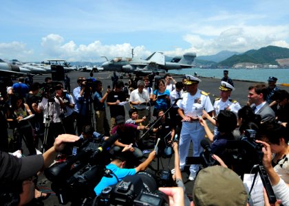 US Navy 110812-N-SB672-158 Rear Adm. Robert Girrier, commander of the Ronald Reagan Carrier Strike Group, and Capt. Thom Burke, commanding officer