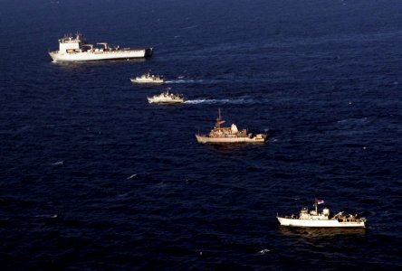US Navy 110816-N-YX920-695 U.S. and Royal Navy mine countermeasure ships are underway in formation with the Royal Navy landing ship dock RFA Lyme B
