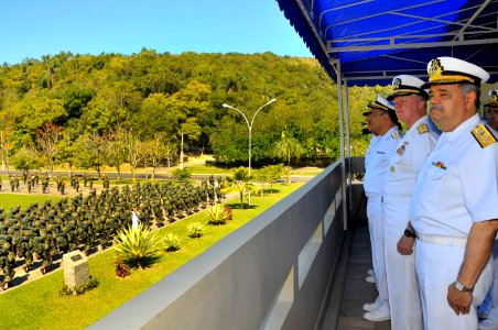 US Navy 110812-N-ZB612-327 Chief of Naval Operations (CNO) Adm. Gary Roughead watches members of an amphibious unit march