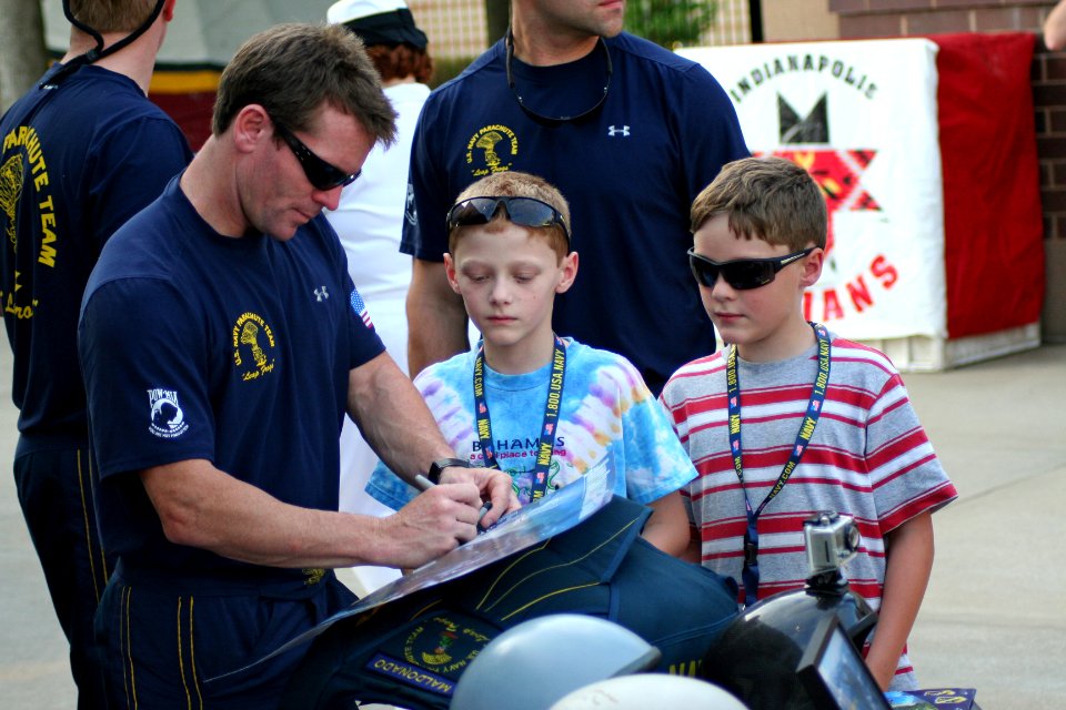 US Navy 110816-N-ZL585-157 The Leap Frogs sign autographs during Indianapolis Navy Week 2011