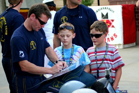 US Navy 110816-N-ZL585-157 The Leap Frogs sign autographs during Indianapolis Navy Week 2011