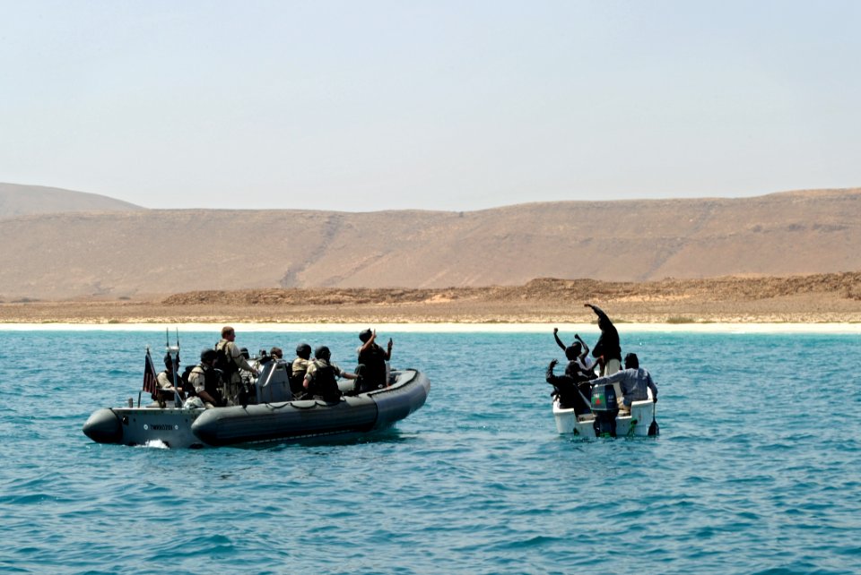 US Navy 110813-N-TY225-165 A visit, board, search and seizure team from the guided-missile cruiser USS Anzio (CG 68) tows a skiff with seven Somali