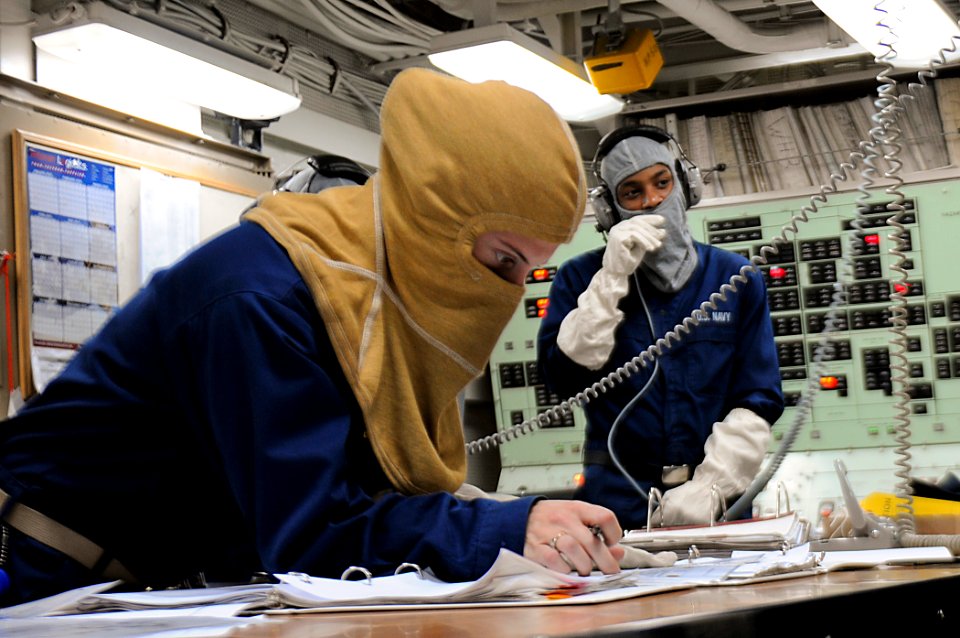 US Navy 110814-N-YM590-002 Sailors participate in a general quarters drill aboard the USS Anzio