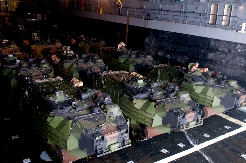 US Navy 110815-N-PB383-001 Amphibious assault vehicles prepare to depart the well deck of the San Antonio-class amphibious transport dock ship USS