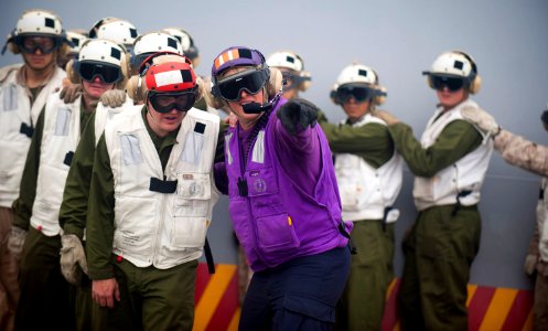 US Navy 110815-N-PB383-007 A Sailor instructs Marines assigned to the 11th Marine Expeditionary Unit (11th MEU) during a firefighting drill on the