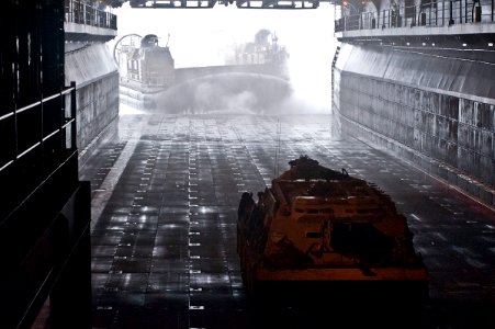 US Navy 110815-N-DX615-126 A landing craft, air cushioned (LCAC) exits the well deck of the amphibious assault ship USS Makin Island (LHD 8)