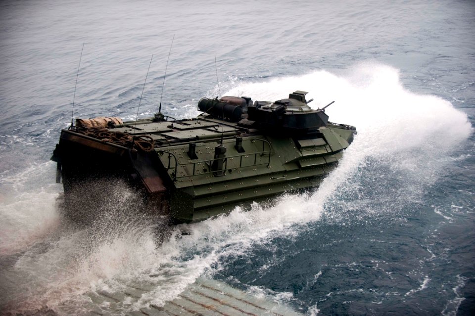 US Navy 110815-N-PB383-004 An amphibious assault vehicle departs the well deck of the San Antonio-class amphibious transport dock ship USS New Orle