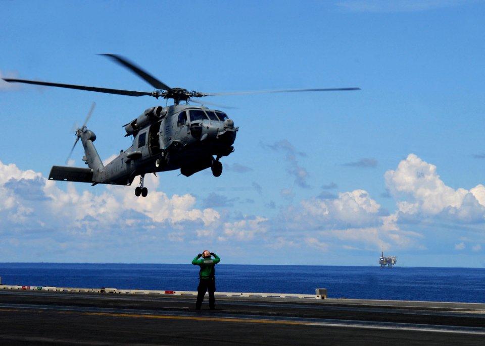US Navy 110816-N-GL340-047 An HH-60H Sea Hawk helicopter assigned to the Black Knights of Helicopter Anti-Submarine Squadron (HS) 4 prepares to lan