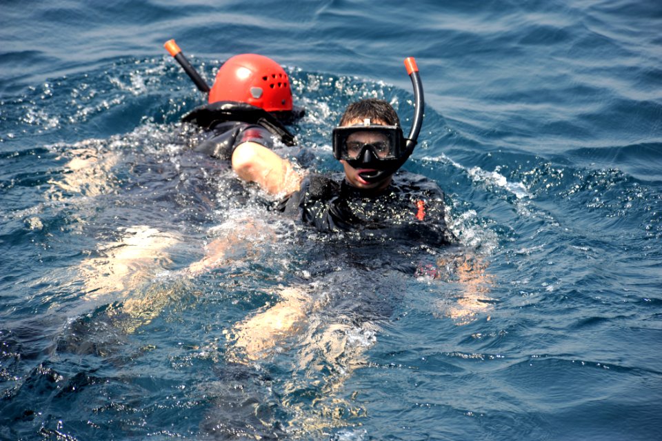 US Navy 110818-N-QL471-314 Rescue Swimmers perform a man overboard drill
