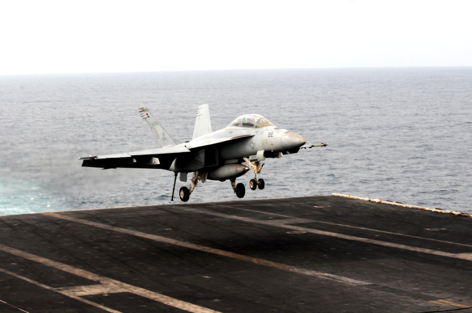 US Navy 110818-N-XE109-002 An F-A-18F Super Hornet assigned to Strike Fighter Squadron (VFA) 213 lands aboard the aircraft carrier USS George H.W