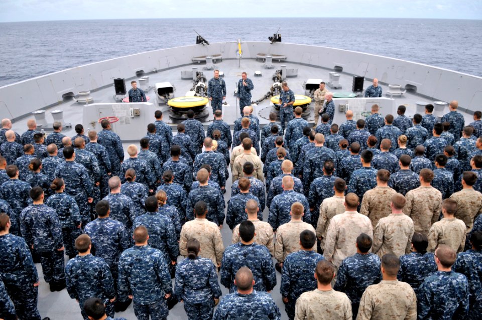 US Navy 110818-N-GW695-584 Sailors, Marines stand at attention on the foc'sle for an all-hands call