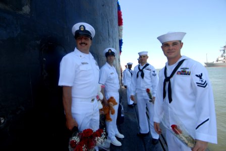 US Navy 110817-N-NK458-129 Sailors wait behind the sail for liberty call to be announced aboard the Los Angeles-class attack submarine USS Scranton photo