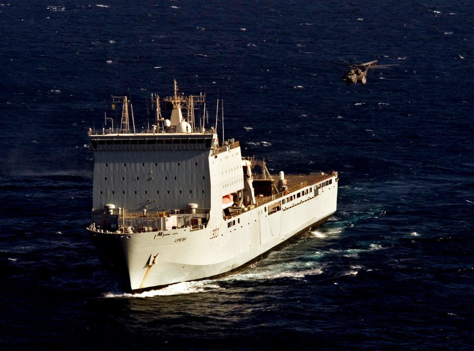 US Navy 110816-N-YX920-300 An SH-60 Sea Hawk helicopter assigned to Helicopter Mine Countermeasures Squadron (HM) 15 approaches the Royal Navy land