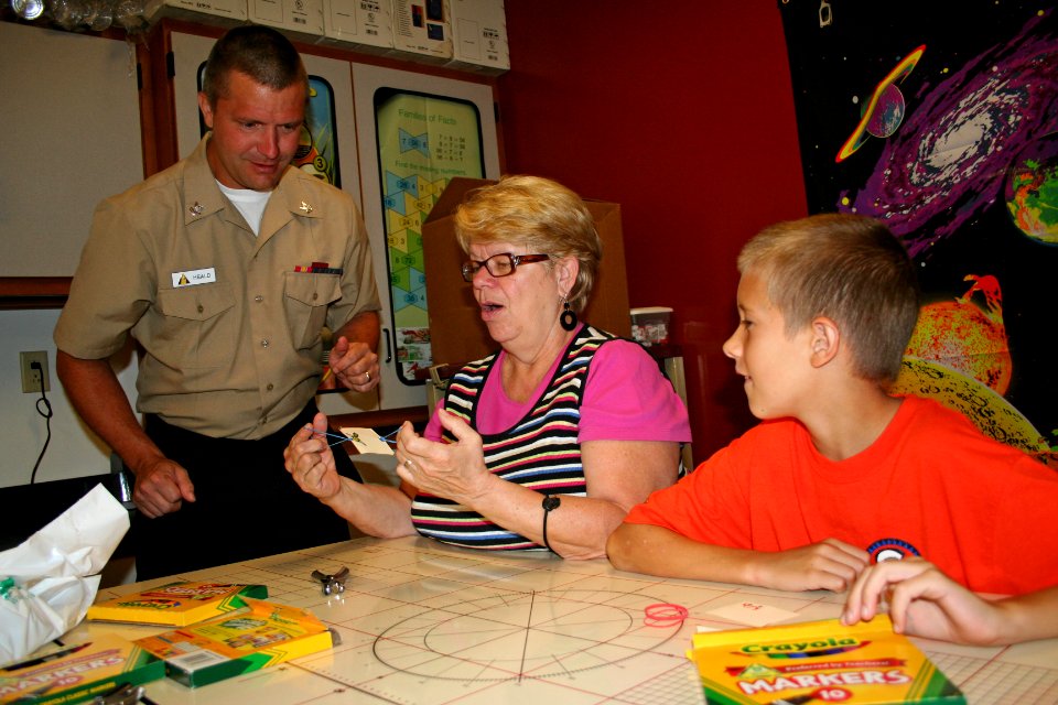 US Navy 110820-N-ZL585-122 A Sailor volunteers at the Camp Dellwood Girl Scout Camp Science Center