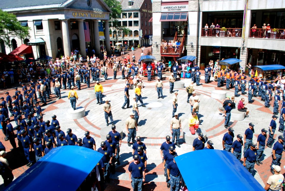US Navy 110817-N-AU127-112 First class petty officers selected to be promoted to chief petty officer sing Anchors Aweigh at Quincy Market during th