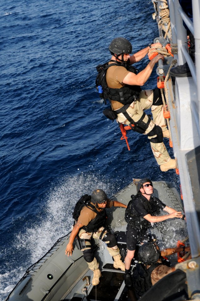 US Navy 110819-N-DU438-393 Ensign Kenneth Perfido, a member of the visit, board, search and seizure team of the guided-missile cruiser USS Gettysbu