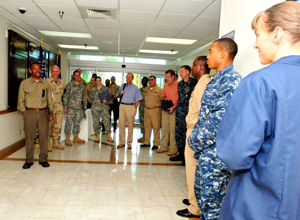 US Navy 110822-N-RF645-131 Dr. Jonathan Woodson, left, Assistant Secretary of Defense for Health Affairs and Director, TRICARE Management Activity