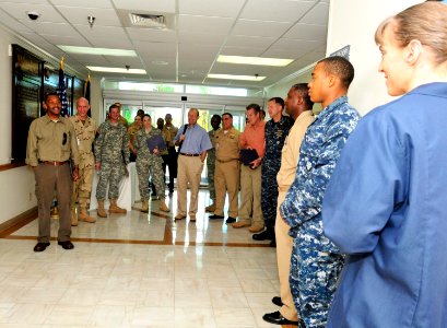 US Navy 110822-N-RF645-131 Dr. Jonathan Woodson, left, Assistant Secretary of Defense for Health Affairs and Director, TRICARE Management Activity