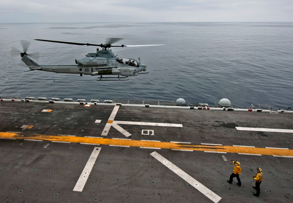 US Navy 110821-N-DX615-300 A UH-1Y Huey helicopter assigned to the Red Dragons of Marine Medium Helicopter Squadron (HMM) 268 takes off from the am