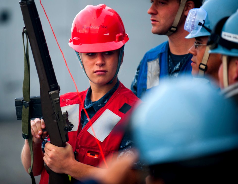 US Navy 110821-N-PB383-331 A Sailor prepares to fire a messenger line