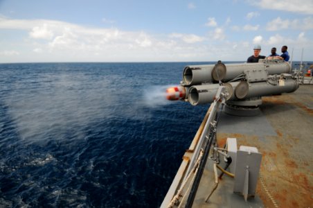 US Navy 110822-N-XQ375-560 Sailors observe a MK-46 recoverable exercise torpedo launch during a weapons exercise aboard the guided-missile destroye
