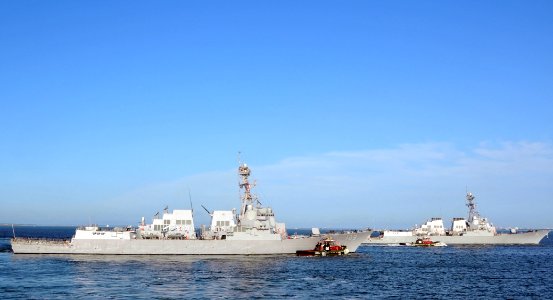 US Navy 110825-N-QY430-064 The Arleigh Burke-class guided-missile destroyers USS Jason Dunham (DDG 109), left, and USS Winston S. Churchill (DDG 8