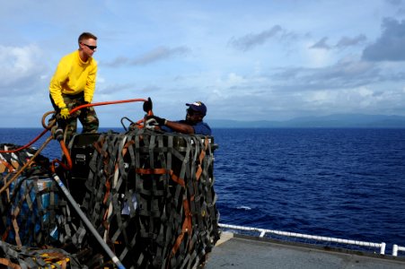 US Navy 110823-F-CF975-015 Pallets are prepared as the USNS prepares to return to Haiti