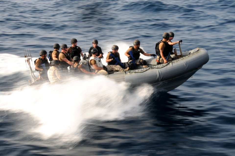 US Navy 110819-N-DU438-506 Members of the visit, board, search and seizure team assigned to the guided-missile cruiser USS Gettysburg (CG 64) maneu