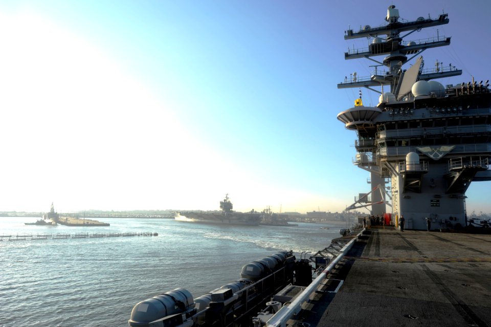 US Navy 110825-N-AU622-032 The aircraft carrier USS Dwight D. Eisenhower (CVN 69) departs Naval Station Norfolk ahead of Hurricane Irene
