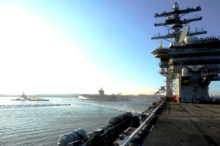 US Navy 110825-N-AU622-032 The aircraft carrier USS Dwight D. Eisenhower (CVN 69) departs Naval Station Norfolk ahead of Hurricane Irene