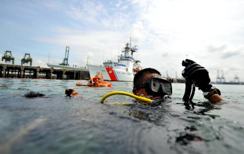 US Navy 110819-N-KB666-187 Cpl. Pinel Mepaquito, a Panamanian navy diver, participates in joint dive operations with divers assigned to Mobile Divi