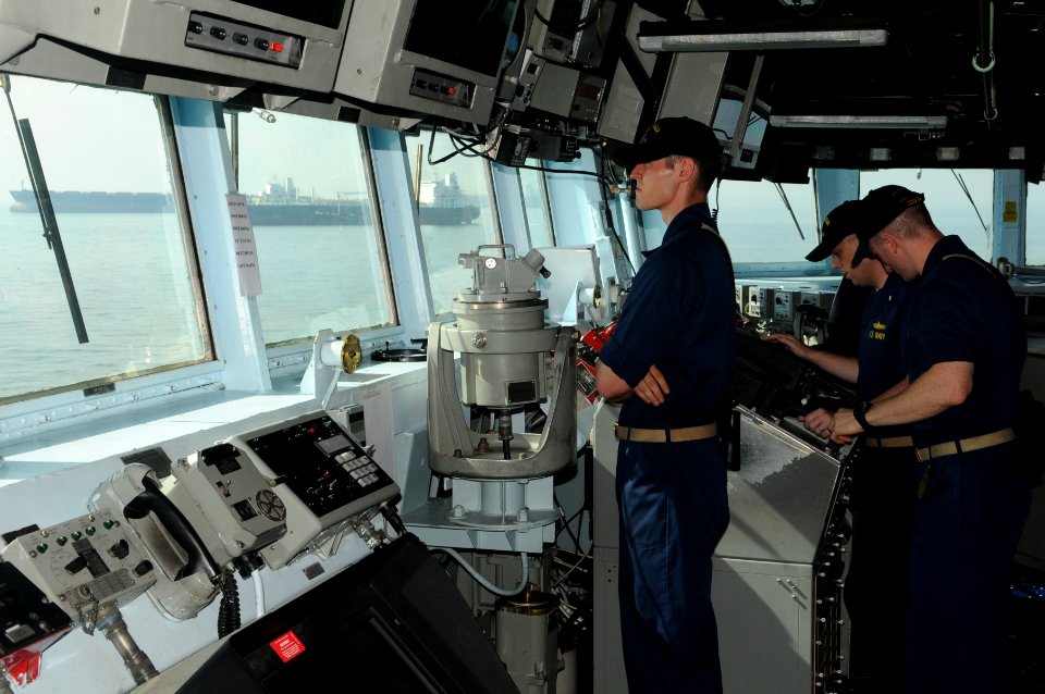 US Navy 110821-N-IO627-008 Sailors stand watch on the bridge of the USS Curtis Wilbur