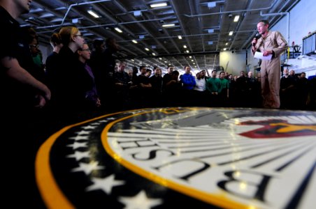 US Navy 110824-N-XE109-016 Rear Adm. Ted Branch addresses the crew of USS George H.W. Bush (CVN 77) during an all-hands call aboard the ship