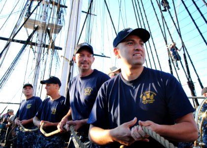 US Navy 110823-N-AU127-252 Chief selectees on the USS Constitution haul on a halyard